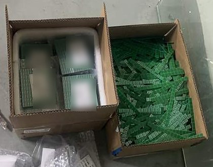 Cartons with small PCBs packed in bags and loose boards